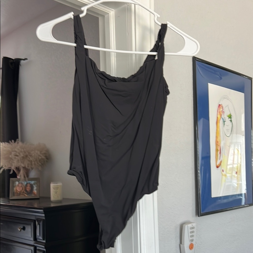 Black Women's SKIMS bodysuit - fits everybody collection